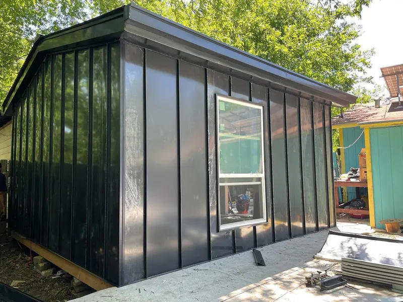 Black standing seam metal wall panels for Roof Inspection in Kosciusko